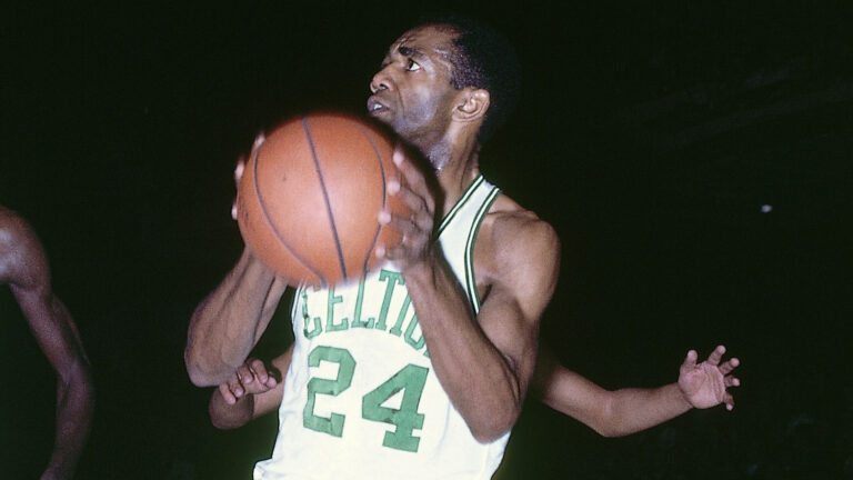 BOSTON, MA - 1962: Sam Jones #24 of the Boston Celtics handles the ball against the Philadelphia 76ers circa 1962 at the Boston Garden in Boston, Massachusetts. NOTE TO USER: User expressly acknowledges and agrees that, by downloading and/or using this photograph, user is consenting to the terms and conditions of the Getty Images License Agreement. Mandatory Copyright Notice: Copyright 1962 NBAE (Photo by Dick Raphael/NBAE via Getty Images)